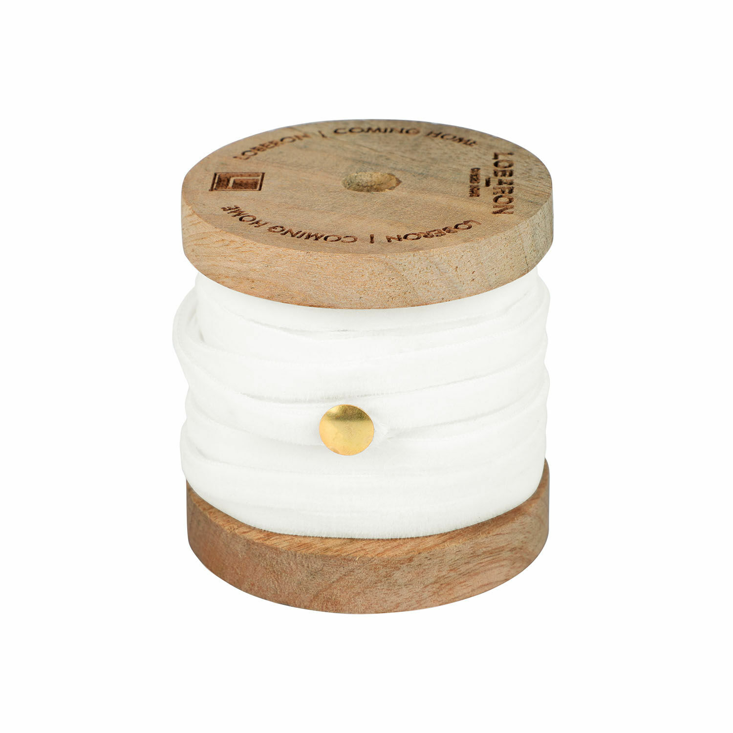 Ruban en velours crème enroulé sur une bobine en bois pour décoration et artisanat