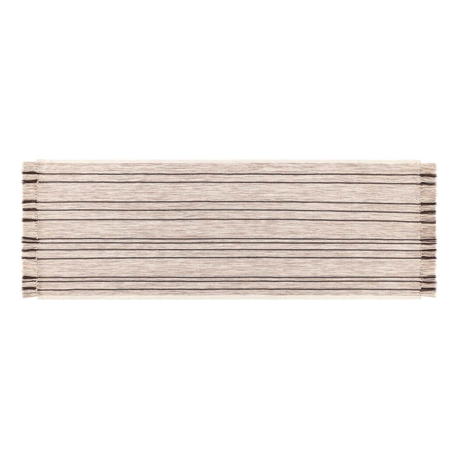Beige katoenen vloerkleed met zwarte strepen en franjes, interieur- en vloerdecoratie
