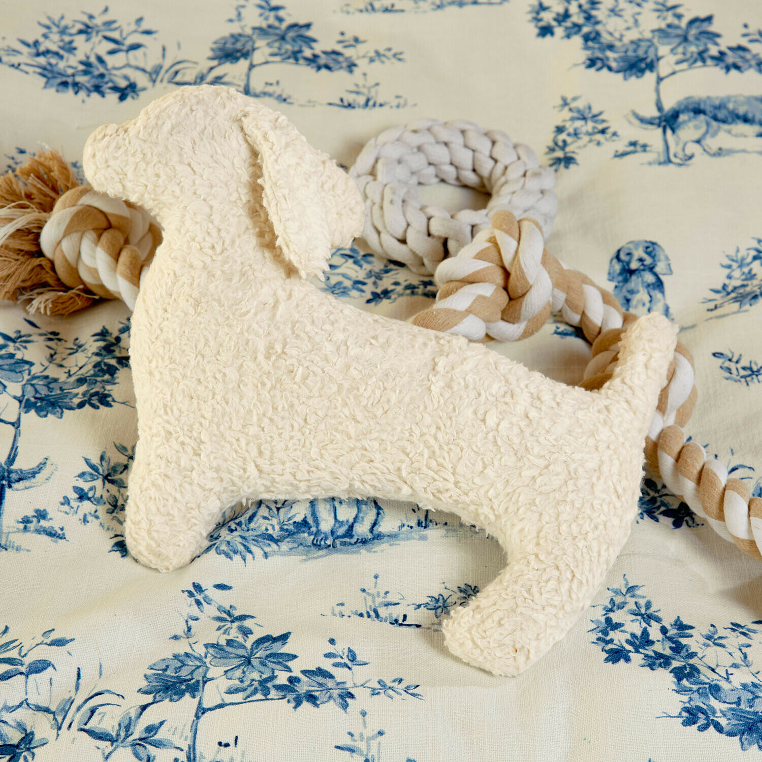 Beige pluche hondenknuffel met katoenen touw om op te kauwen en spelen