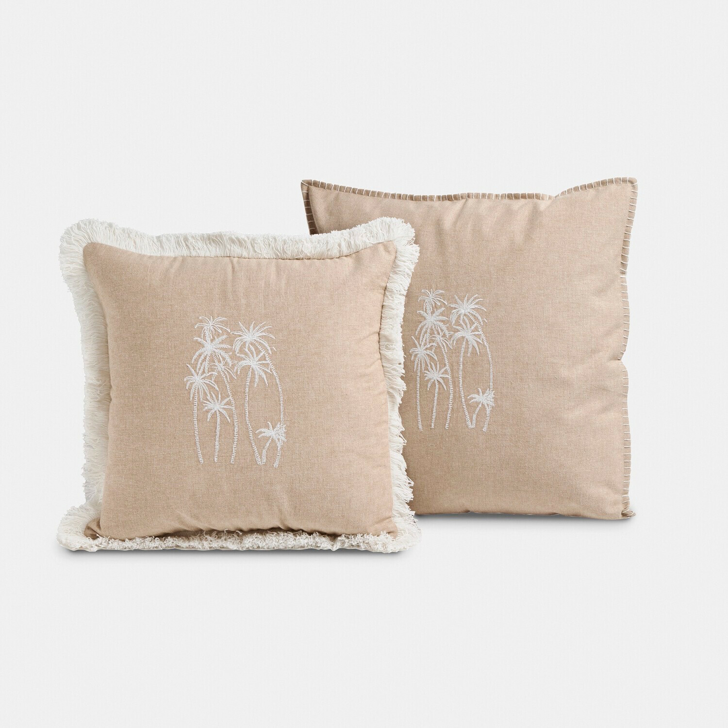 Coussins beiges décoratifs en tissu doux avec broderie de palmiers blancs et franges