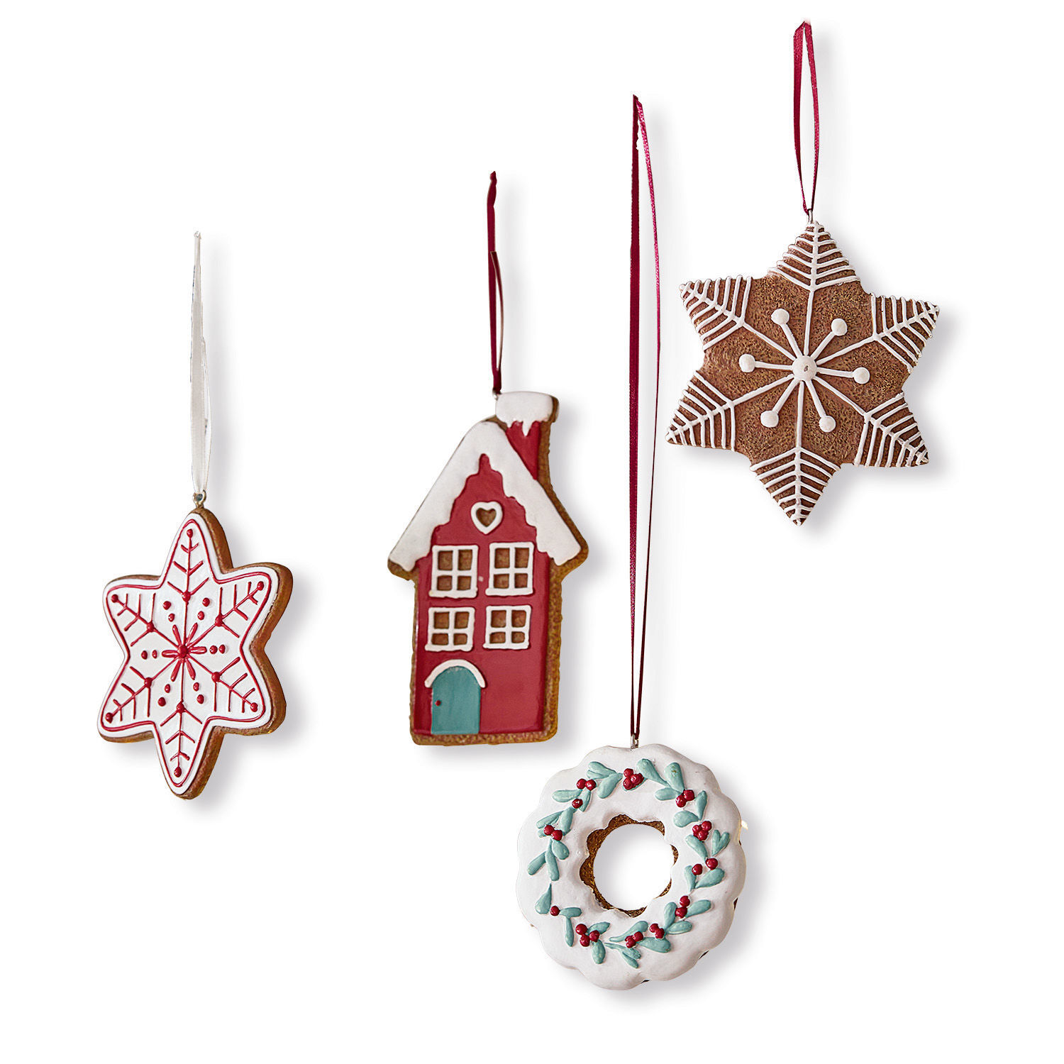 Lot de 4 décorations à suspendre Hestur Ensemble de quatre décorations de Noël en pain d'épices avec glaçage blanc et rouge pour sapin