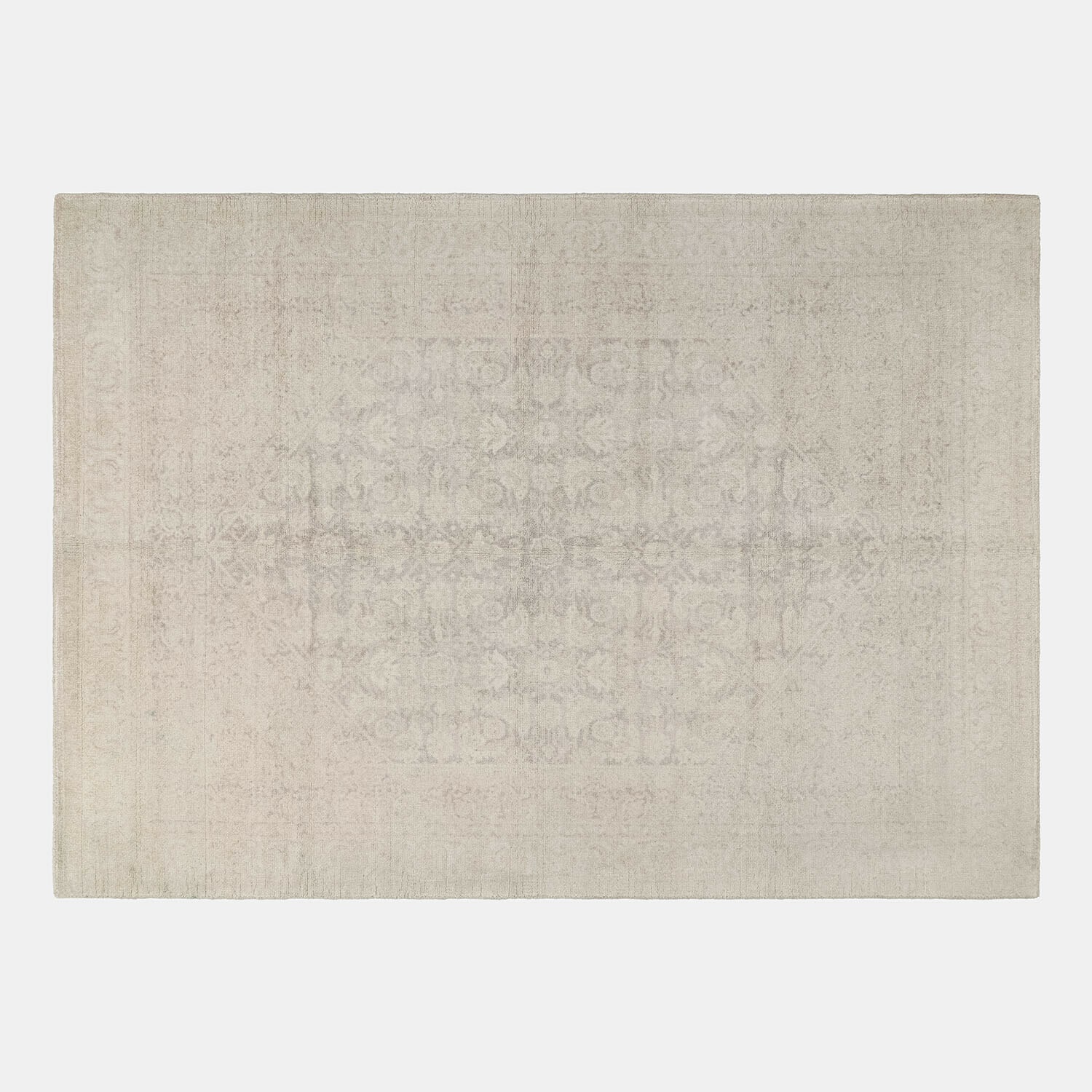 Tapis beige clair avec motif subtil, tissu doux idéal pour salon moderne