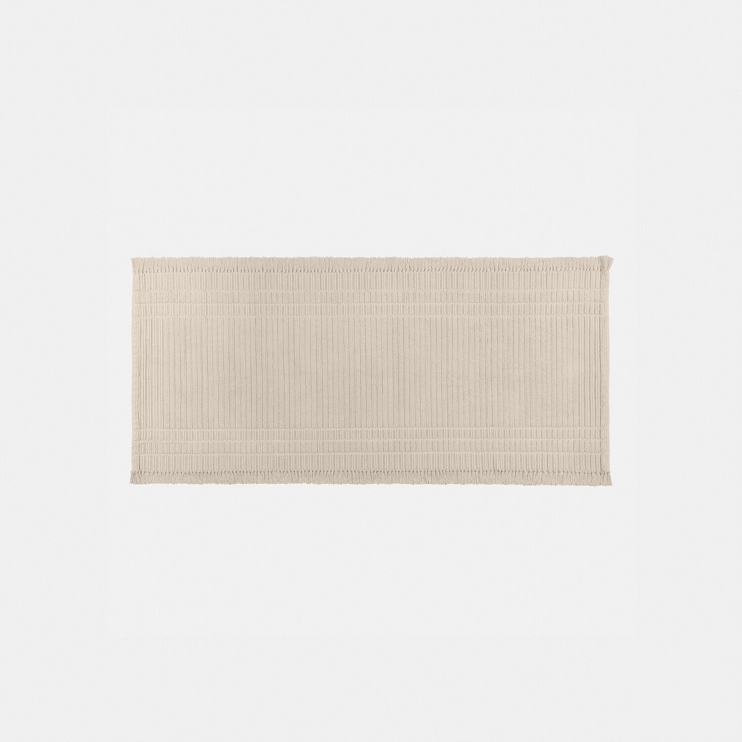 Loper Clairenne Beige katoenen badmat met subtiel patroon en franjes aan de randen voor badkamer
