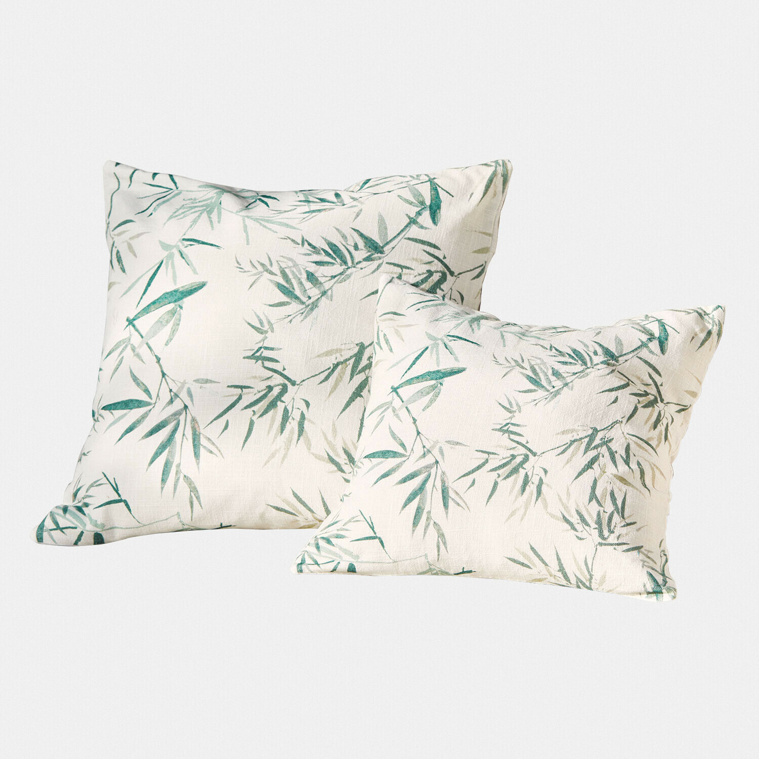Kussenhoes set van 2 Clarisa Set van twee decoratieve katoenen kussens in crème met groen bamboebladmotief