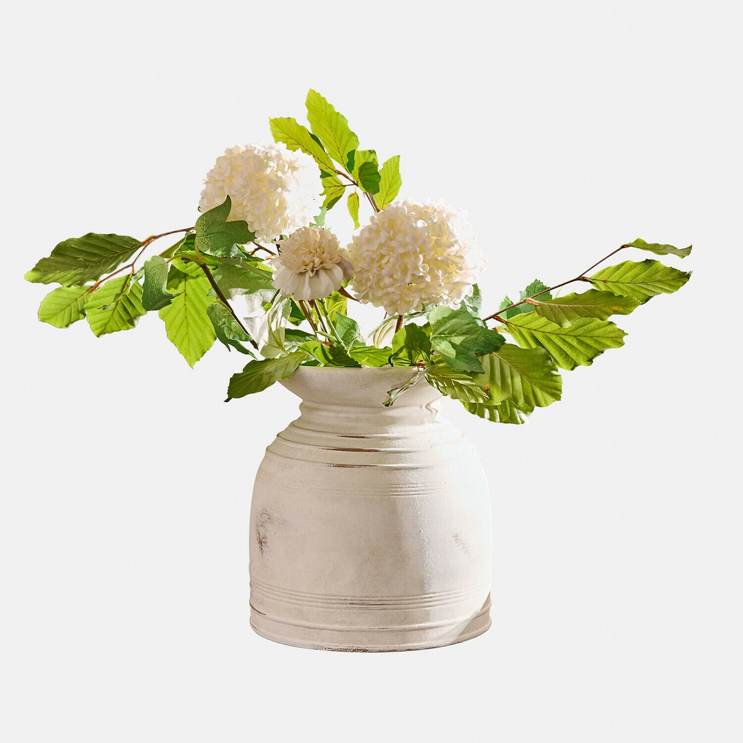 Vaas Niverana Witte keramische vaas met groene bladeren en witte decoratieve bloemen voor binnen
