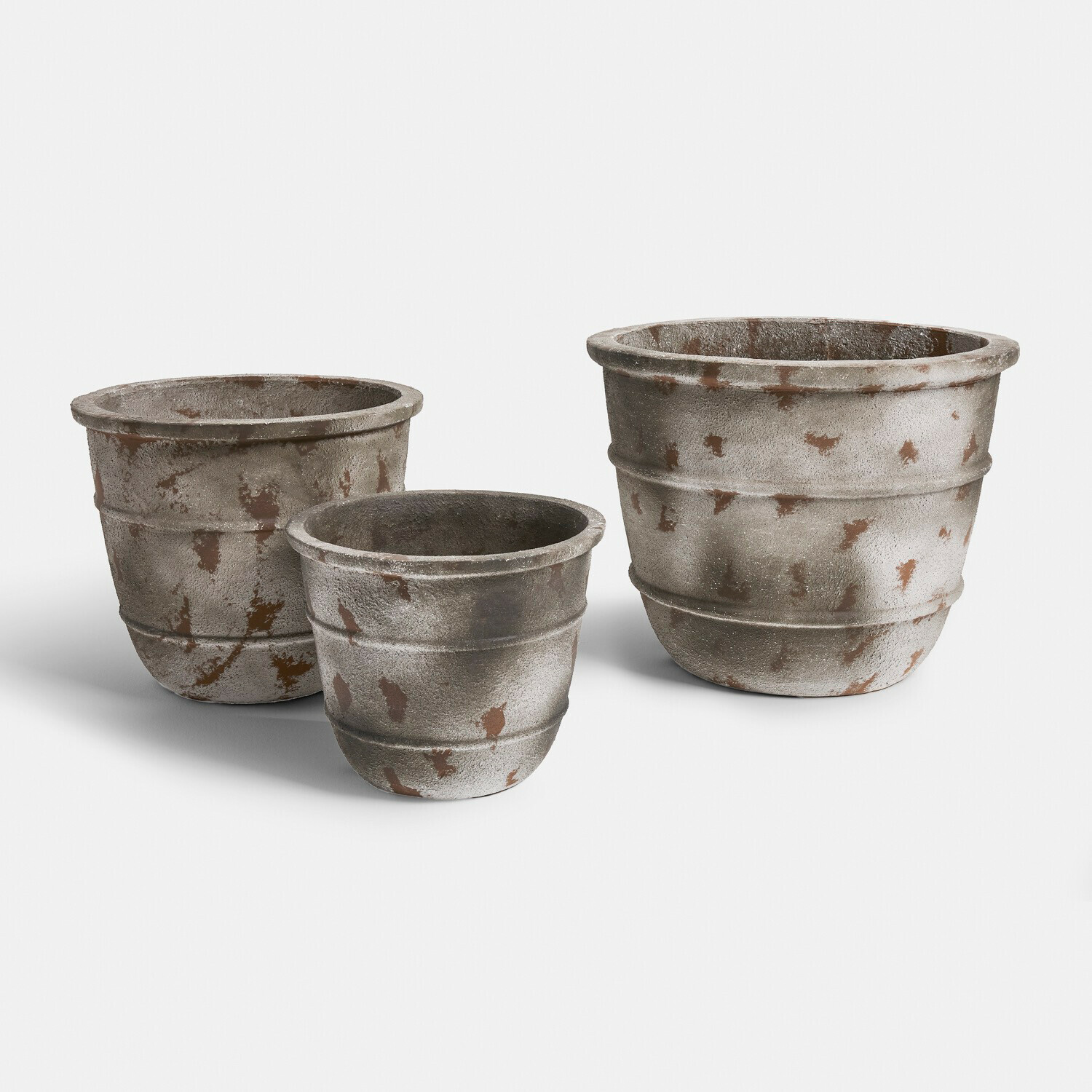 Sierpot set van 3 Arlivonne Set van drie grijze betonnen potten met rustieke uitstraling voor tuin en interieur