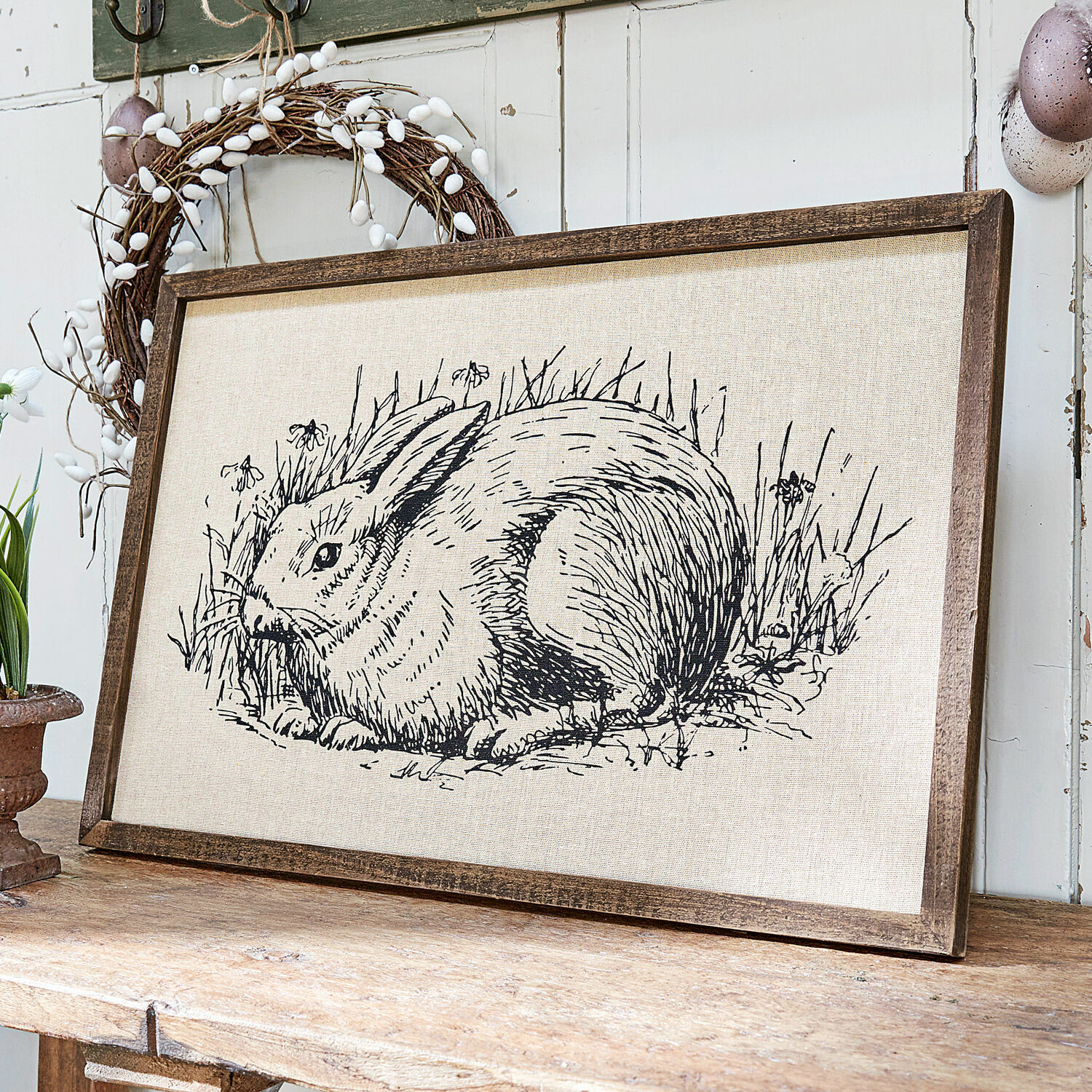Tableau Cedric Tableau avec dessin noir et blanc d'un lapin sur toile en lin dans un cadre en bois, décoration murale.