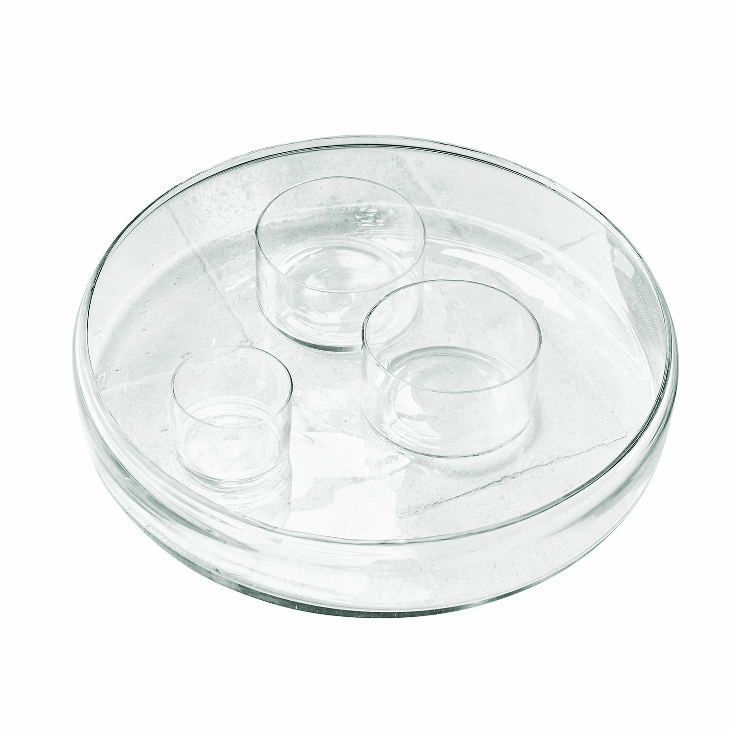 Transparante glazen schaal met drie kleine glazen bakjes voor decoratie en serveren