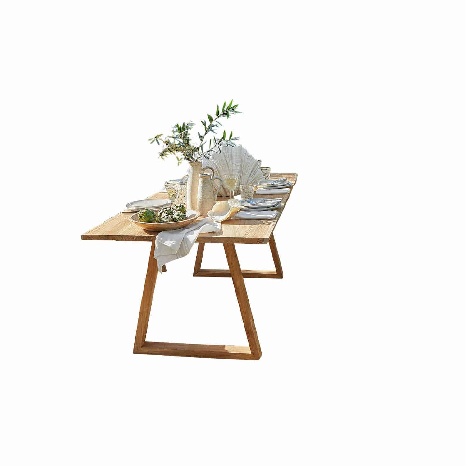 Table Saulny Table à manger en bois avec décoration en céramique et branches vertes sur fond clair