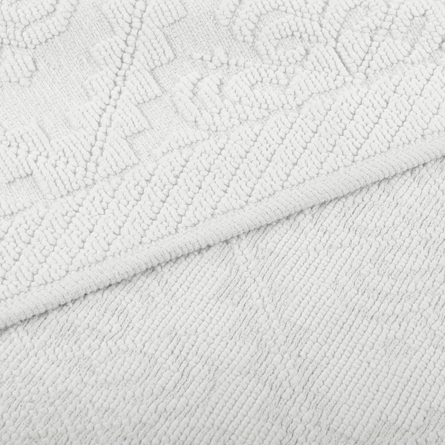 Witte Mivorex badmat van zacht katoen met subtiel patroon, antislip en absorberend