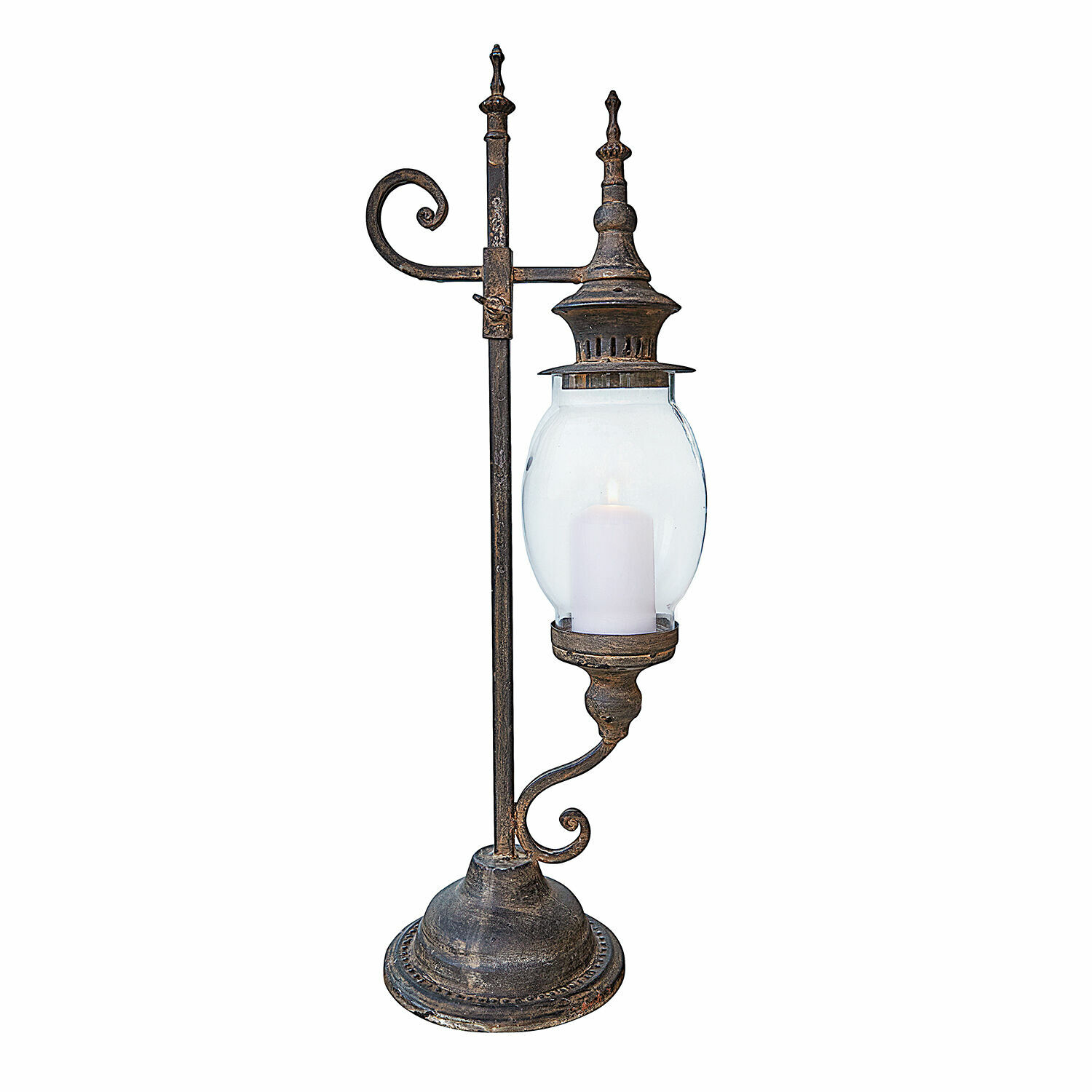 Metalen tafellamp met doorzichtige kap en witte kaars in vintage stijl