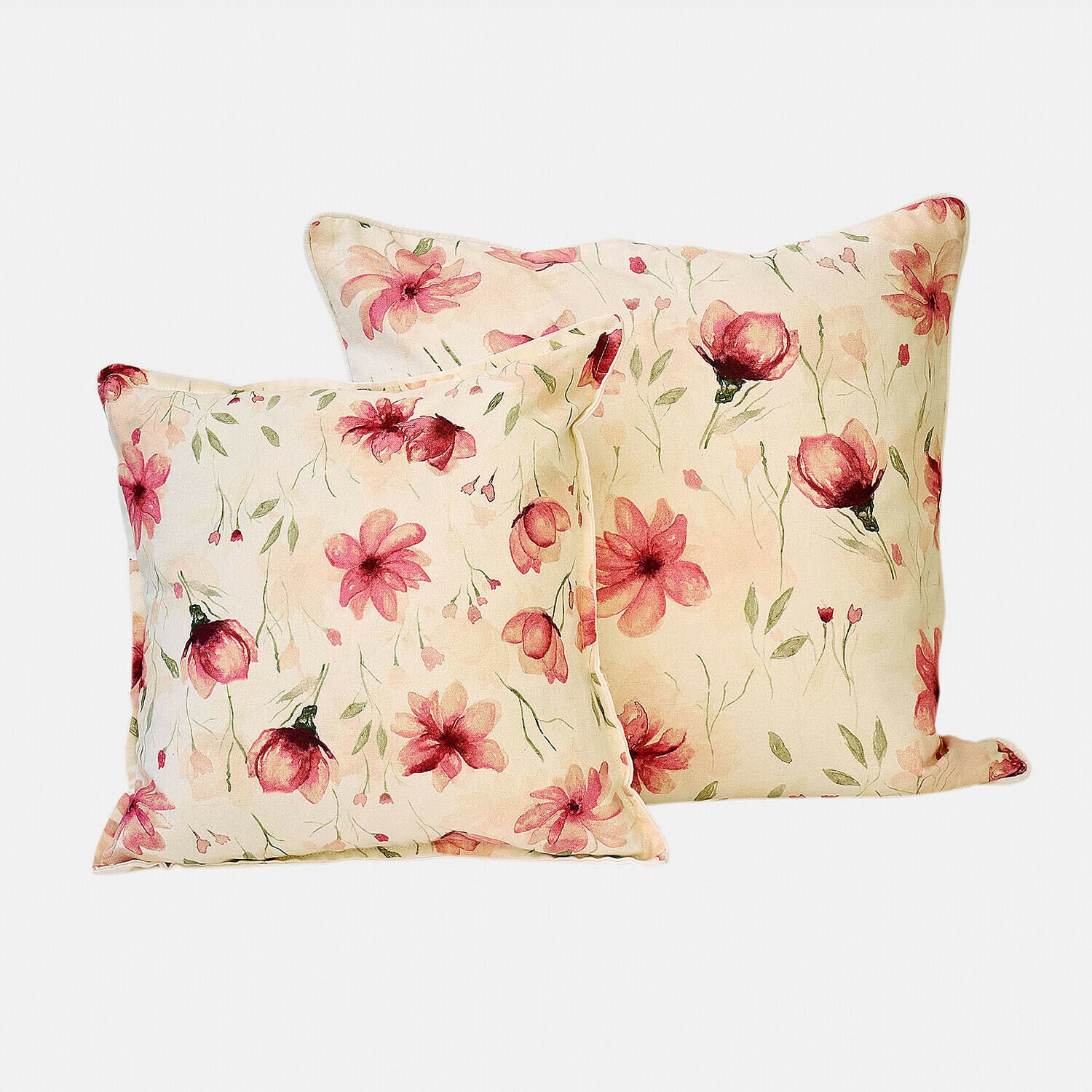 Ensemble de deux coussins carrés en coton crème avec motif floral rose pour décoration intérieure