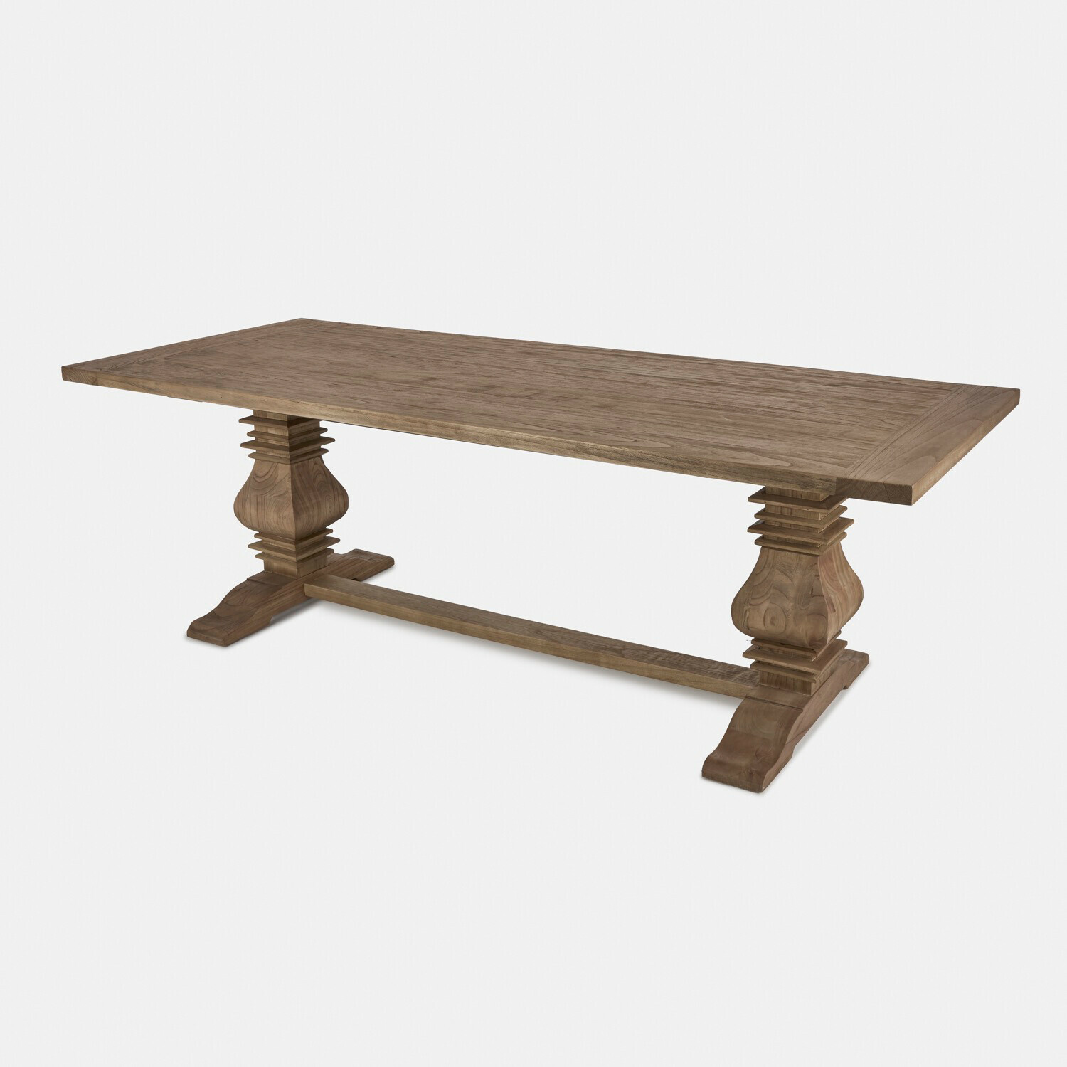 Table à manger Cain en bois brun avec pieds sculptés et plateau robuste pour salle à manger
