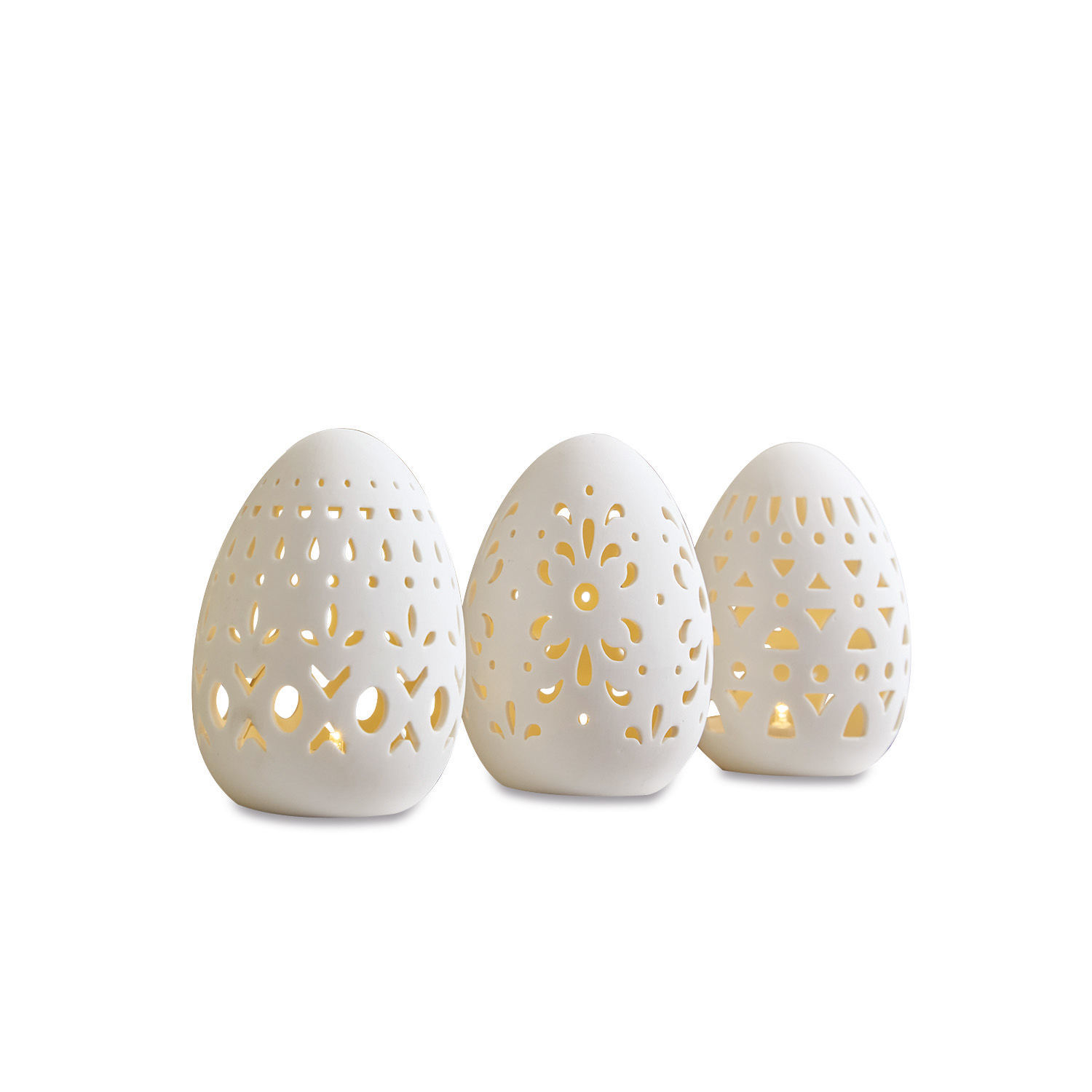 Lot de 3 œufs de Pâques Mouna Trois photophores en céramique blanche en forme d'œufs avec motifs ajourés et lumière LED chaude