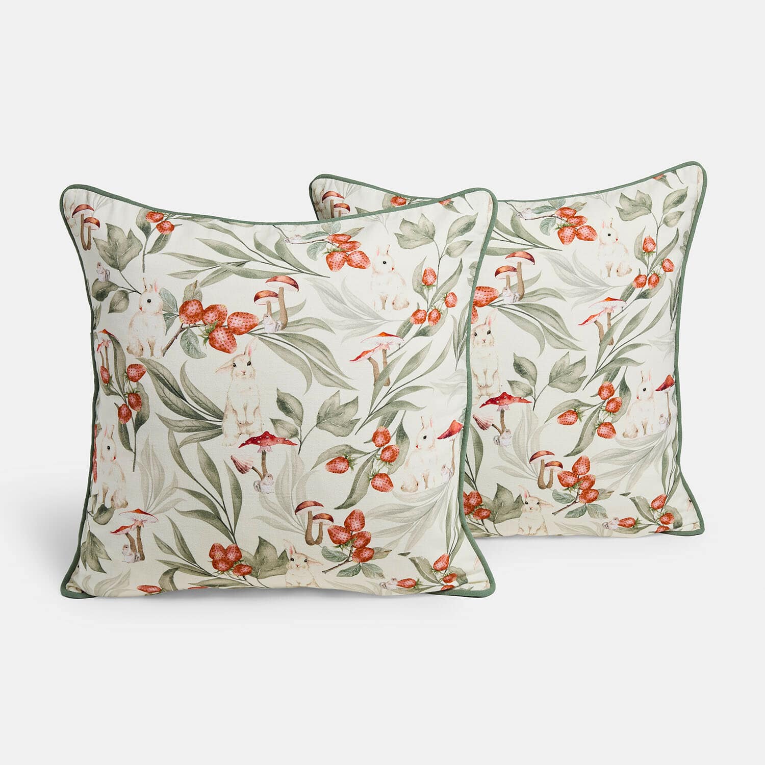 Housses de coussin en coton avec motif lapins et fraises aux tons verts et rouges