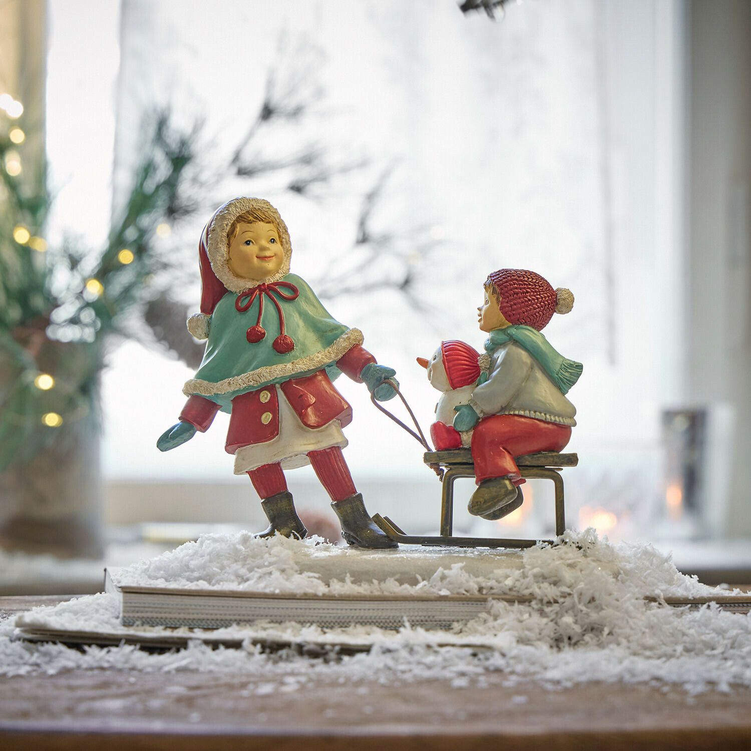 Decoratieve kindjes met slee Petitnid Decoratieve kindjes met slee Petitnid