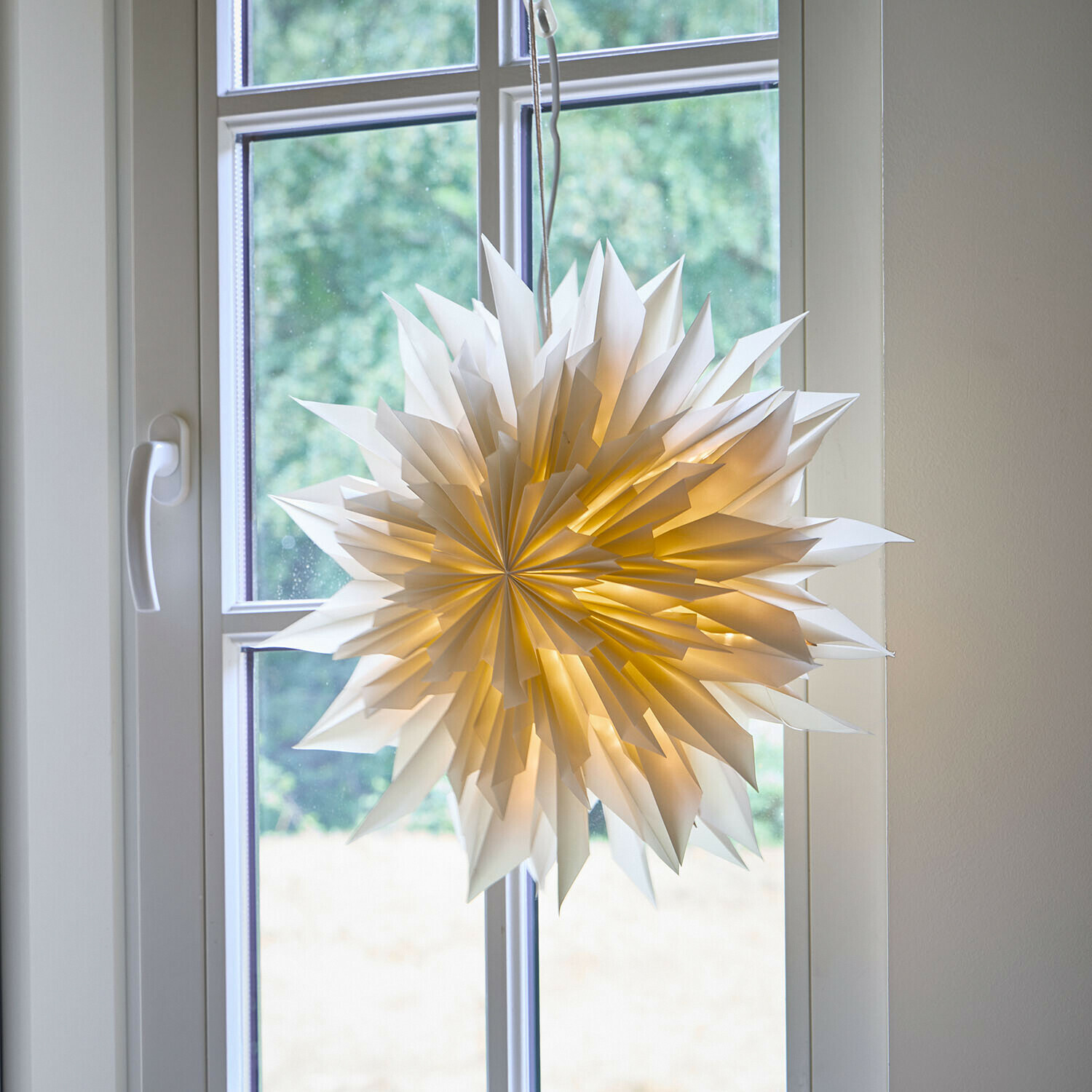 Papieren ster met verlichting Tindrae