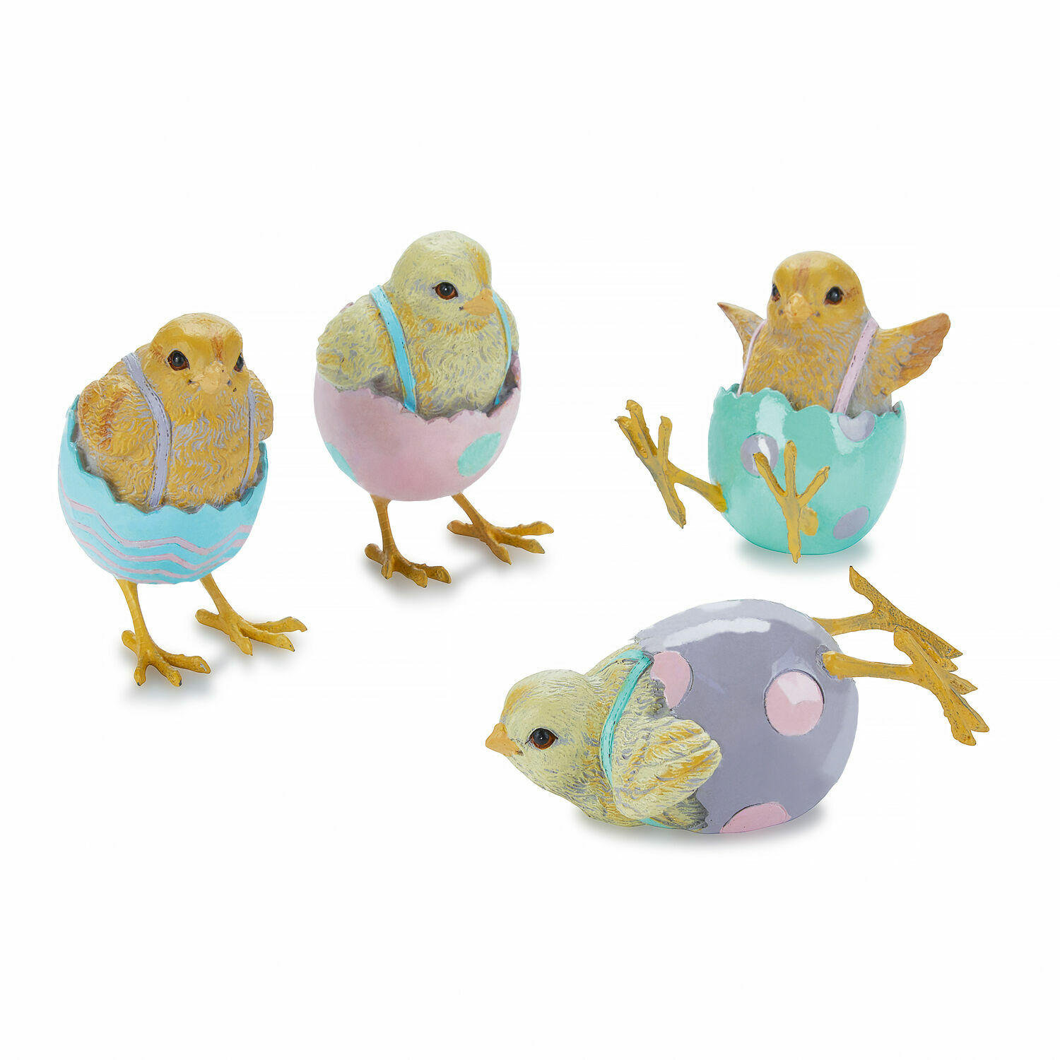 Ensemble de quatre poussins décoratifs dans des coquilles pastel pour Pâques