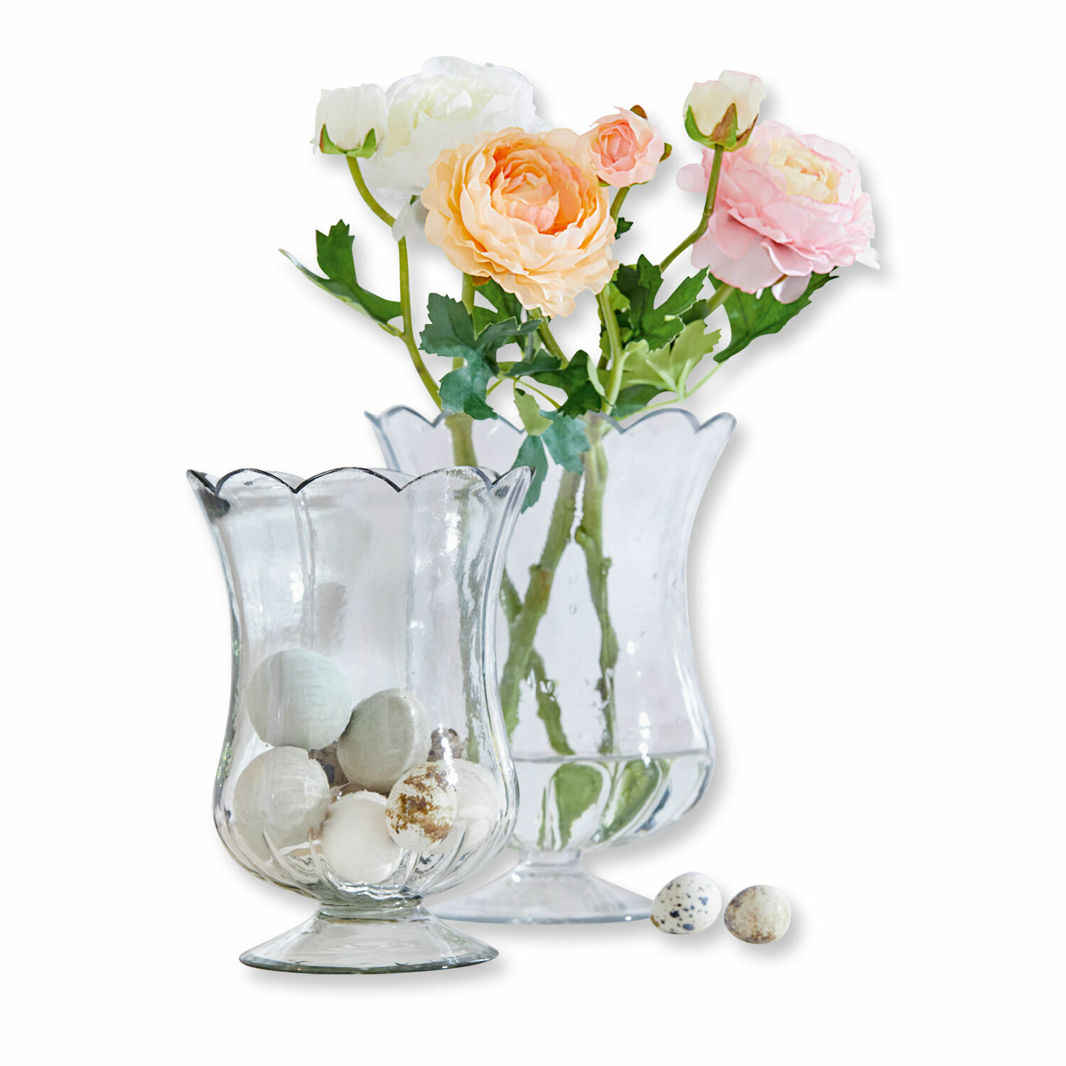 Set van twee heldere glazen vazen Wilgard met bloemen en decoratieve eieren