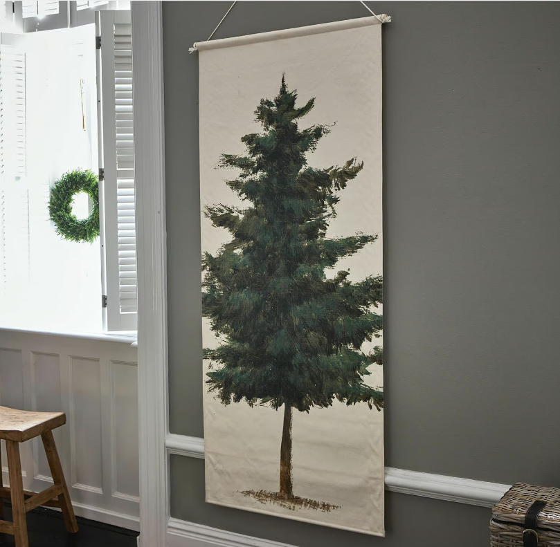 Toile décorative avec un pin vert sur fond beige pour une ambiance naturelle intérieure