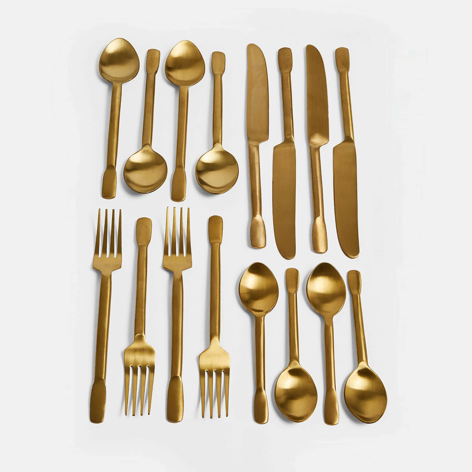 Bestek Malroy Bestekset van goudkleurig roestvrij staal met messen, vorken en lepels voor de eettafel