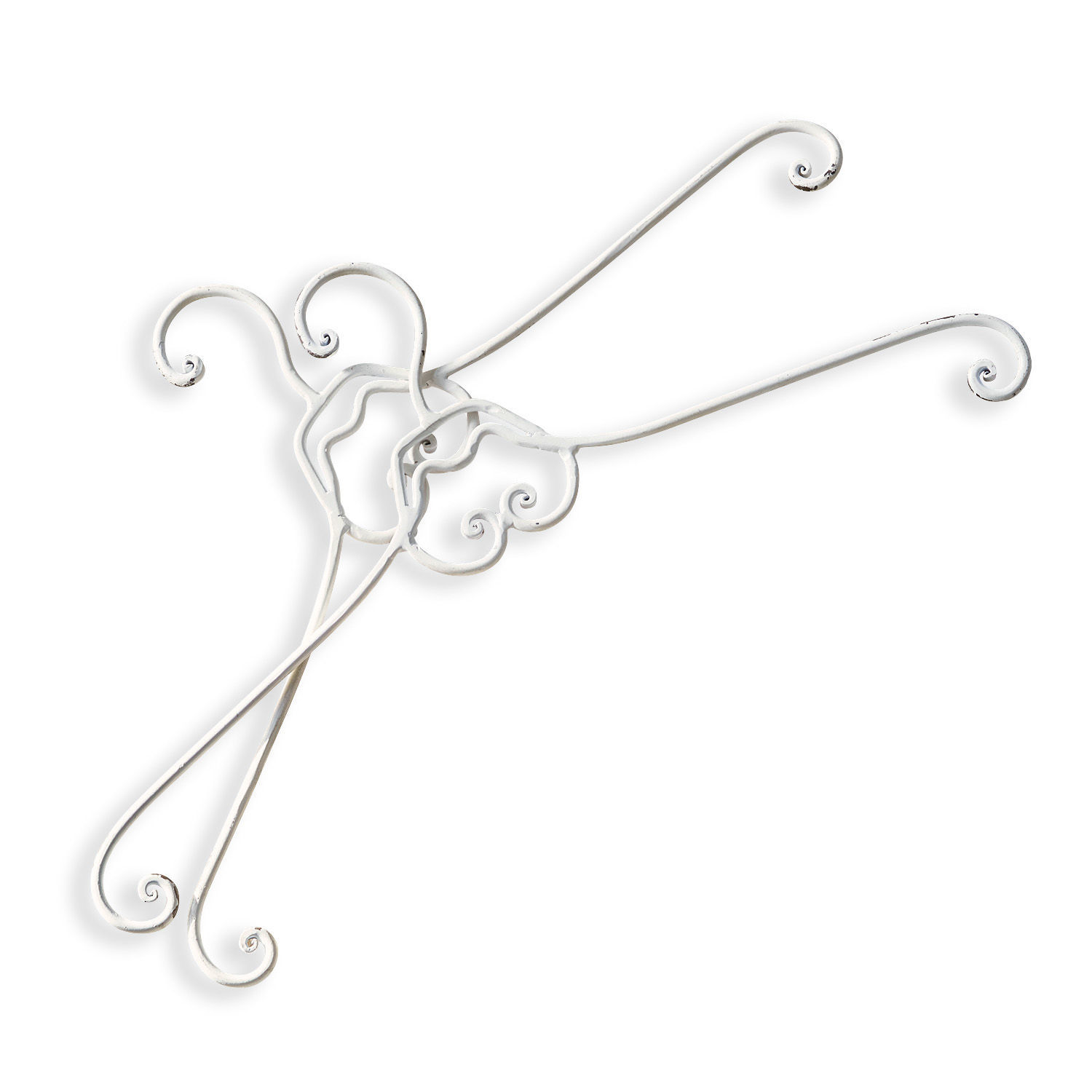 Witte metalen haken met sierlijke krullen voor wanddecoratie of ophanging