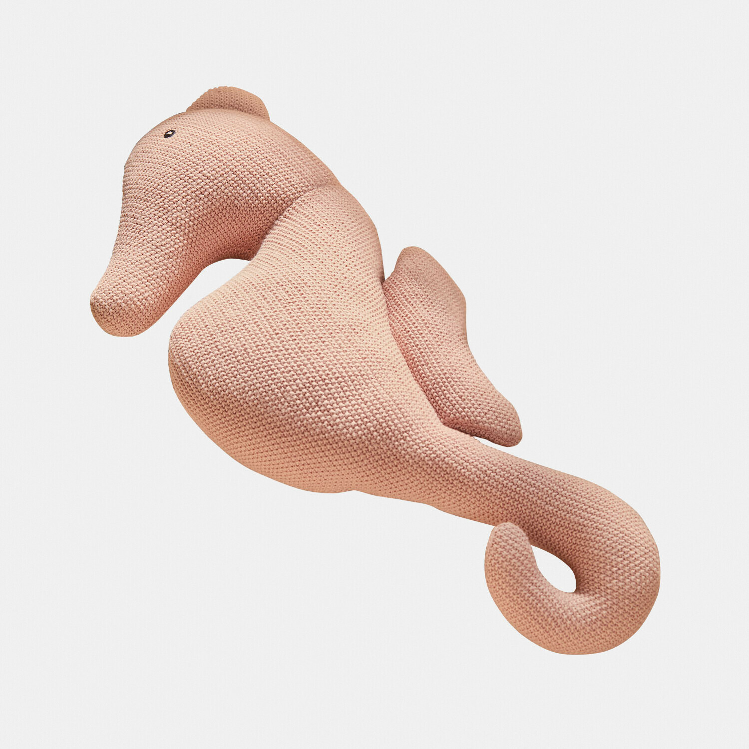 Roze gebreid pluche zeepaardje voor interieurdecoratie en kinderspeelgoed