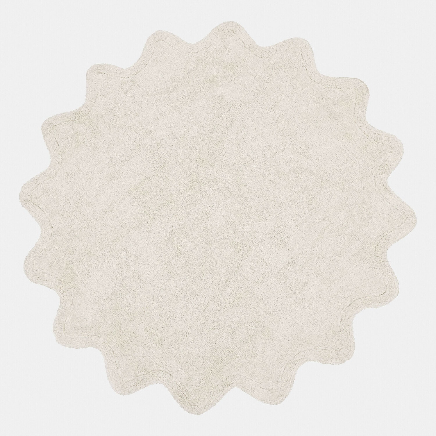Tapis de bain rond crème en tissu doux avec bord ondulé pour une décoration élégante