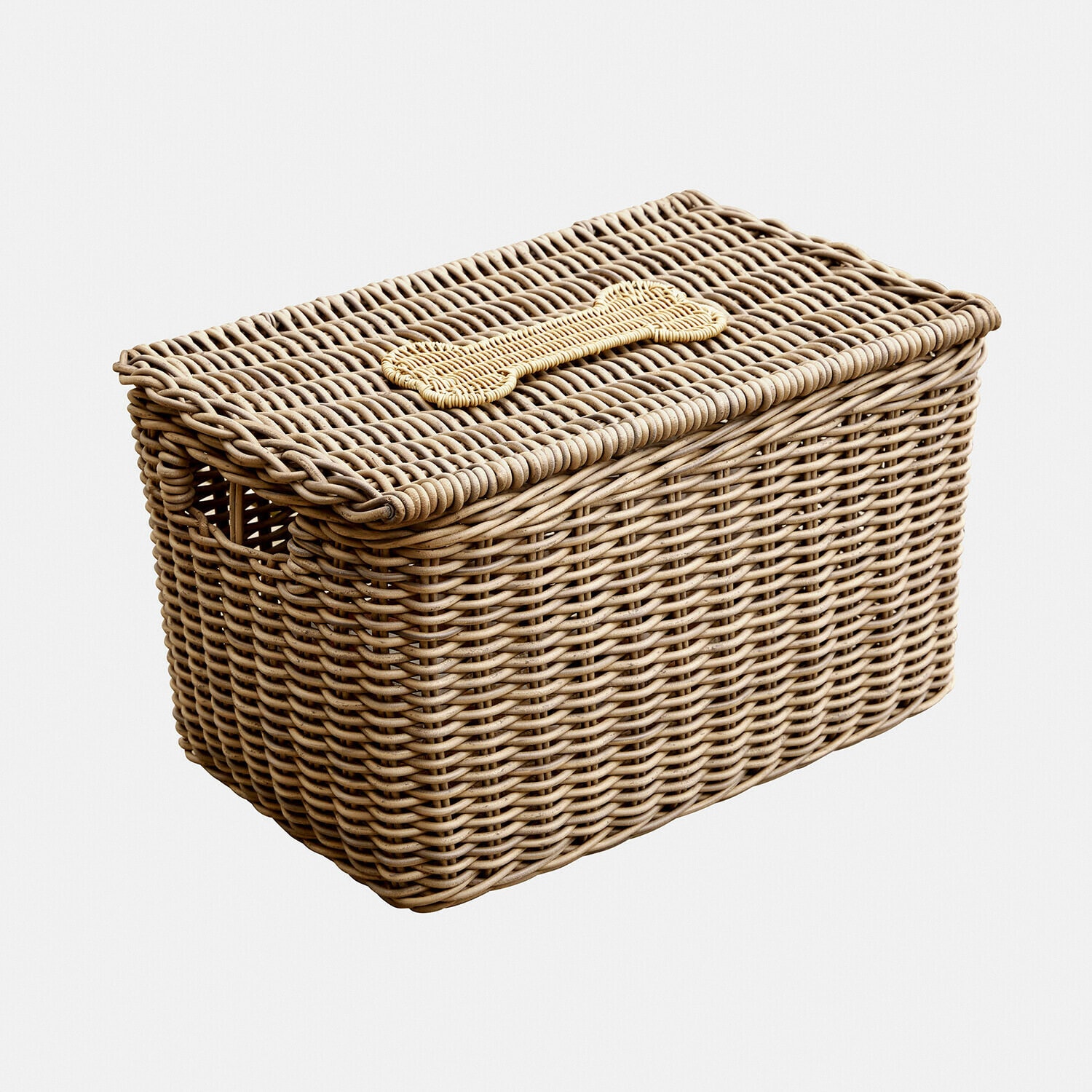 Panier en rotin naturel avec décoration os, parfait pour ranger les accessoires pour chien à la maison