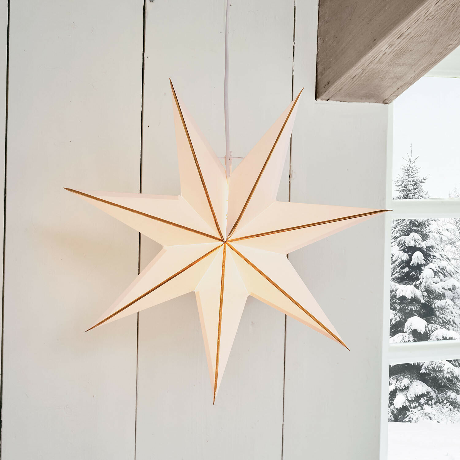 Papieren ster met verlichting Stardomen