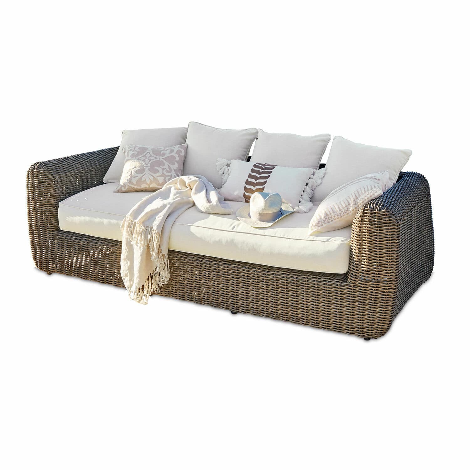Bank Bogdanne Rotan bank met crèmekleurige kussens en deken, perfect voor tuin en terras