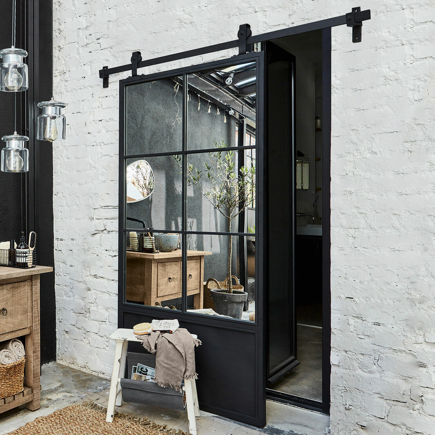 Porte coulissante Bonnaire Porte coulissante noire en métal avec miroir style industriel pour intérieur moderne