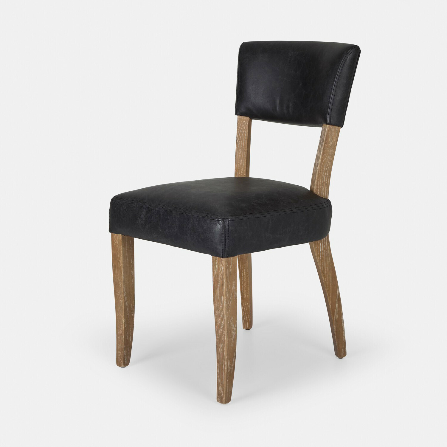 Stoel Norevaux Stoel met zwart leren zitting en houten poten, modern ontwerp voor eetkamer of kantoor